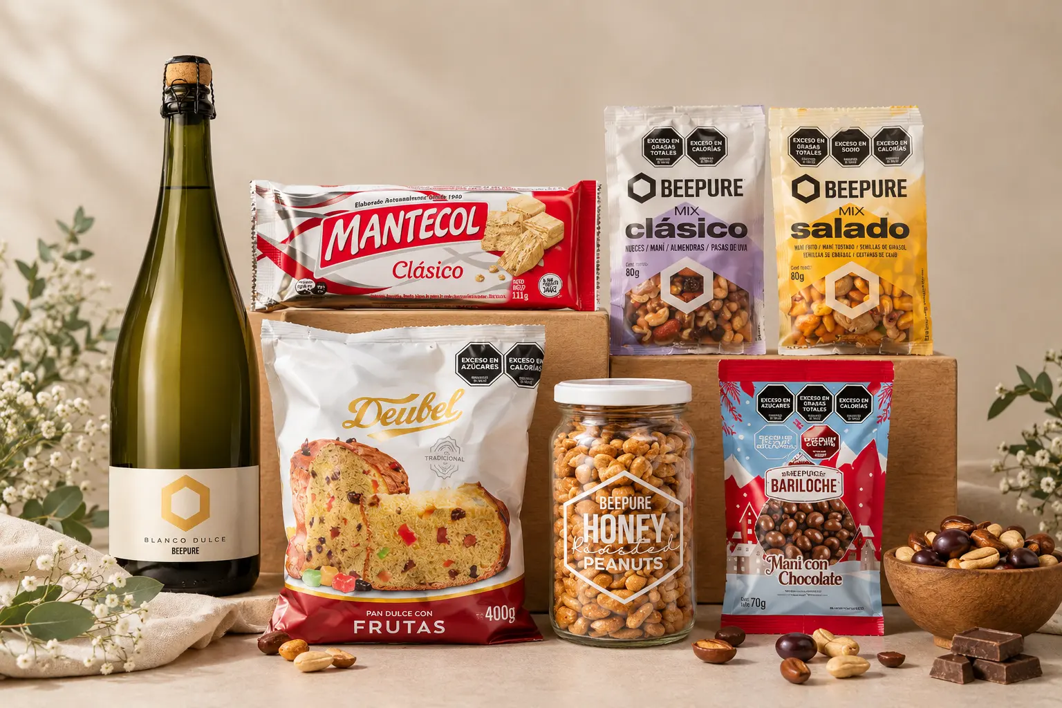 Box Esencial de BEEPURE con espumante, pan dulce y mixs