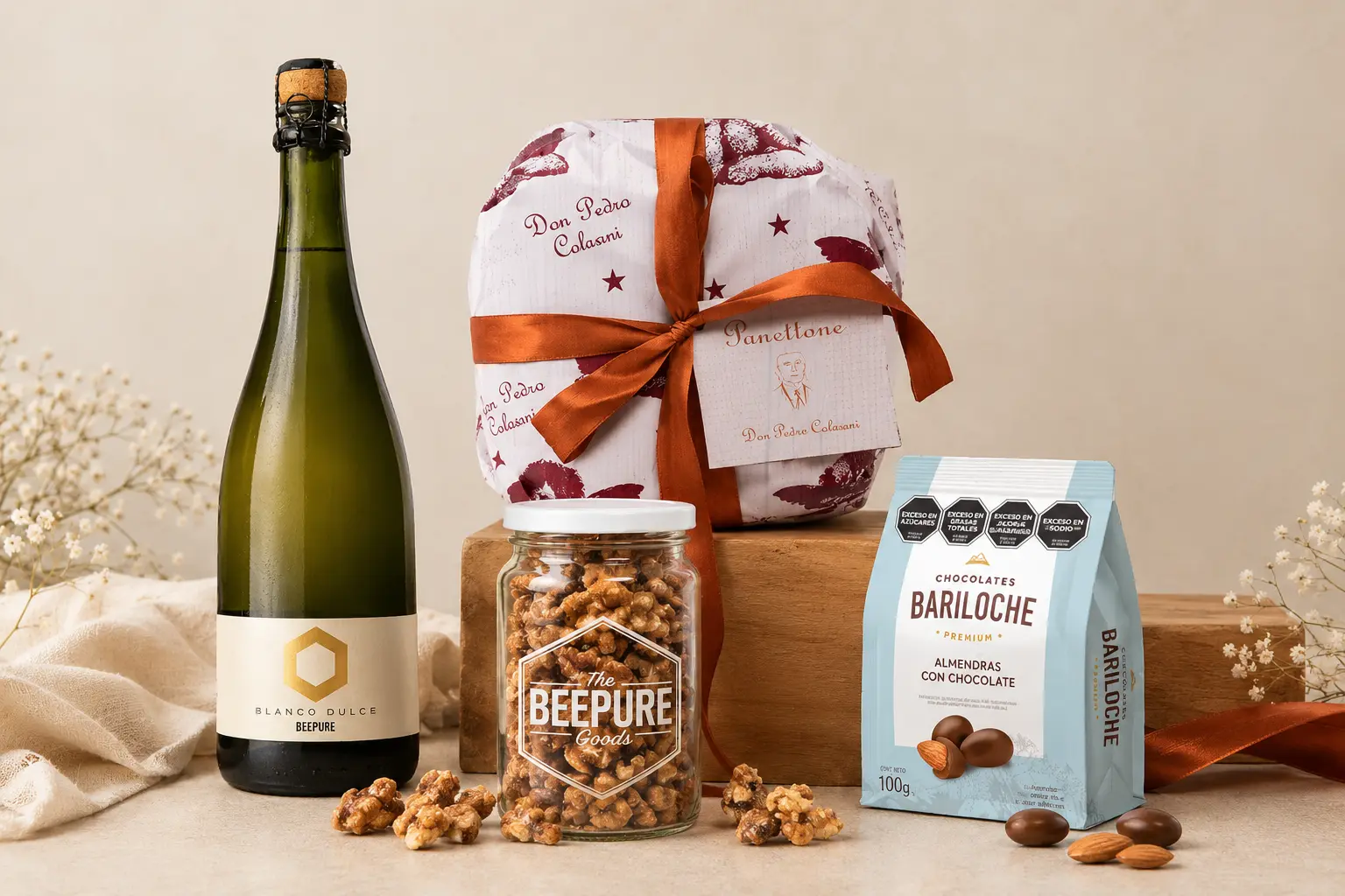 Box Esencial Premium de BEEPURE con espumante, panetone y almendras